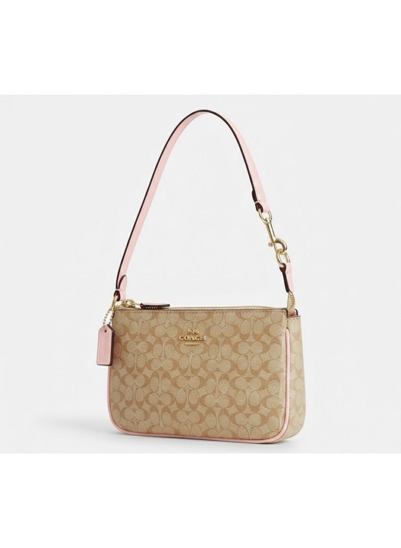 coachoutlet Coach Nolita 19 in Signature Canvas with Pink Leather Trim - Image 1